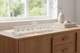 Crystal oil menorah on wooden sideboard