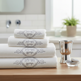 Elegant white hand towels with embroidery
