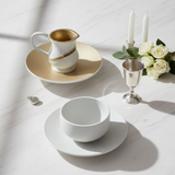 Flat-lay composition with Maim Achronim set