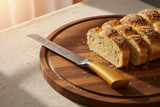 Knife on challah board