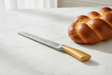 Knife with challah bread