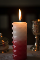 Lit Havdalah candle with flame