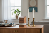 Tzedakah box styled in home setting