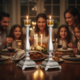 Candlesticks with oil cups lit during Shabbat dinner