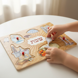 Child playing with Shabbat puzzle