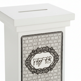 Close-up of Hebrew inscription and decorative pattern
