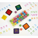 Flat lay with stamped Hebrew letters