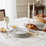 Gold knife on Shabbat table setting