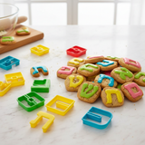 Hebrew letter cookies on marble counter
