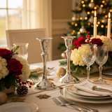 Holiday table close-up with silver candlesticks