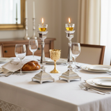 Shabbat table setting with striped silver candlesticks