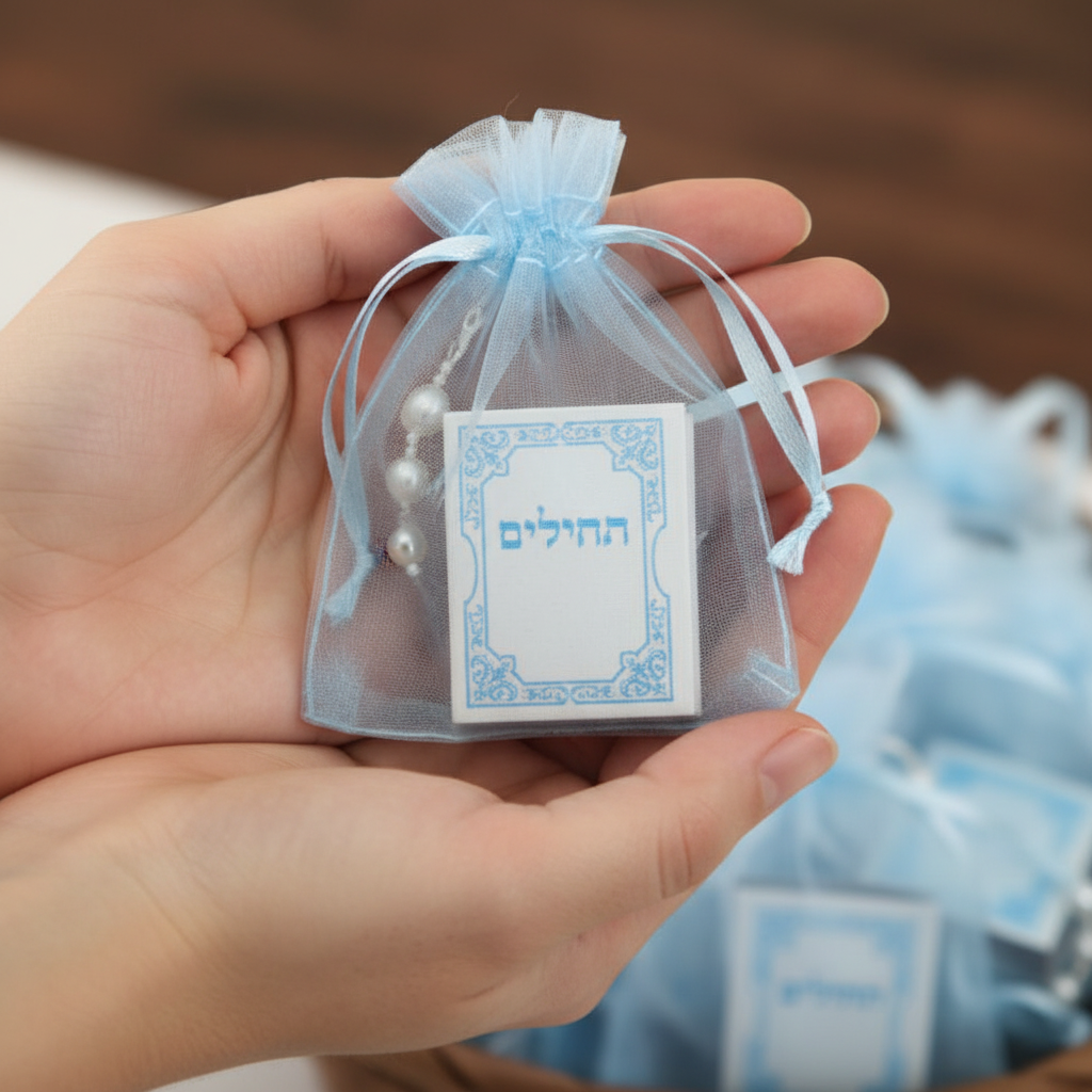 Tehillim book held in hands showing size