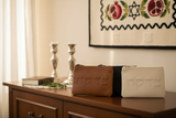 Tzedakah bags in Jewish home setting