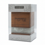 Tzedakah box with white epoxy in gift packaging